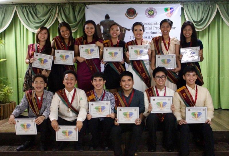 The 13 graduating UPLB Gabay Volunteers receive medals and certificates of service award during the first testimonial and recognition program on 4 July 2015 at the Makiling Hall.